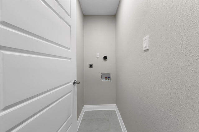 clothes washing area with washer hookup and hookup for an electric dryer