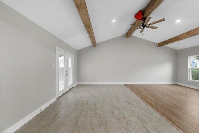 unfurnished living room featuring french doors, ceiling fan, light hardwood / wood-style flooring, and vaulted ceiling with beams
