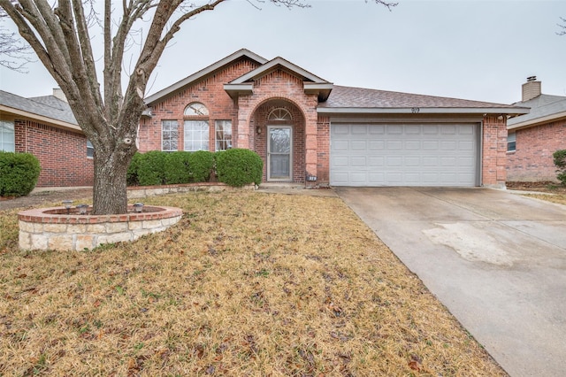 ranch-style house featuring a garage and a front yard