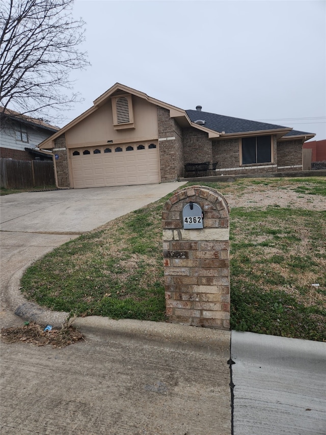 view of front of property featuring a garage