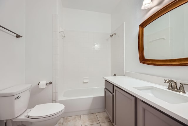 full bathroom with vanity, tiled shower / bath, tile patterned floors, and toilet