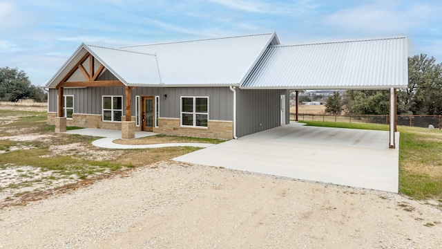 view of front of home with a carport