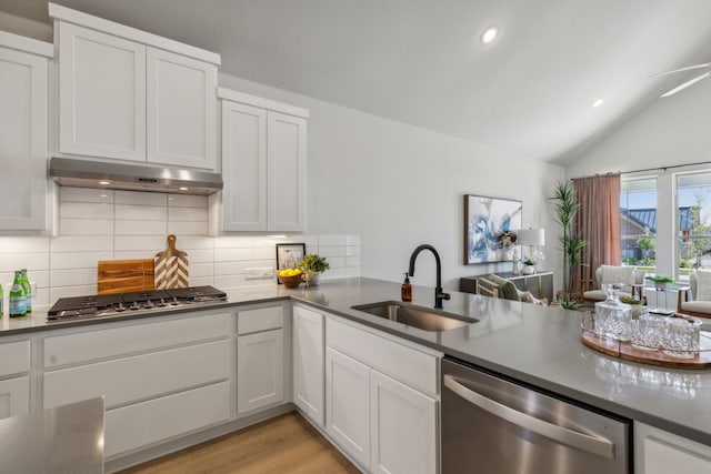 kitchen featuring white cabinetry, sink, and appliances with stainless steel finishes