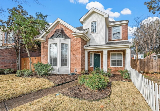 view of front property with a front lawn