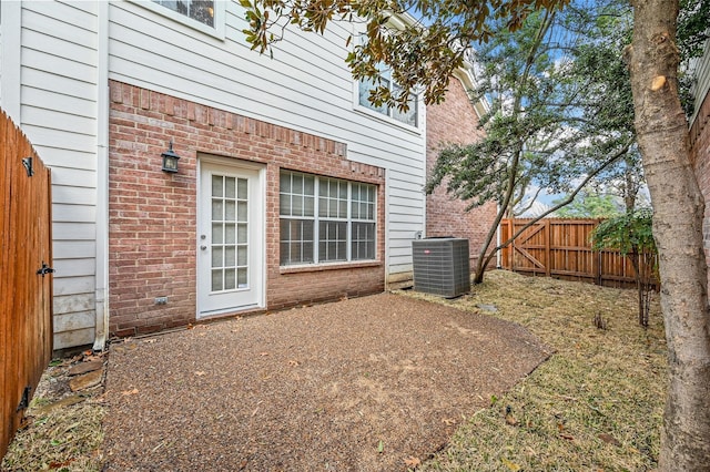 exterior space featuring central AC unit