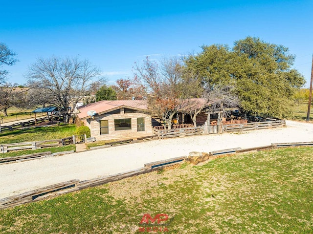 exterior space featuring a lawn