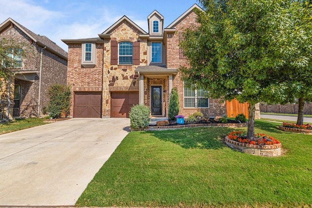 front facade featuring a garage and a front lawn