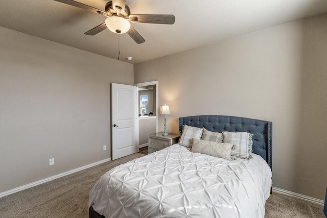 bedroom featuring ceiling fan and carpet