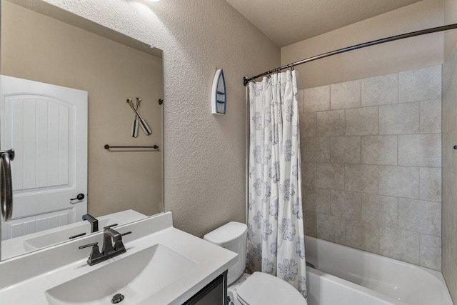 full bathroom with vanity, shower / bath combination with curtain, a textured ceiling, and toilet