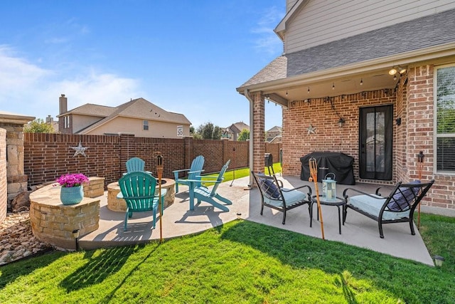 view of patio with a grill