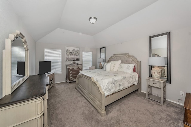 carpeted bedroom featuring vaulted ceiling