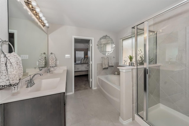 bathroom featuring separate shower and tub, tile patterned flooring, and vanity