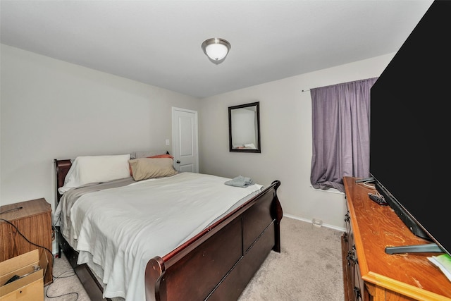 bedroom with light carpet