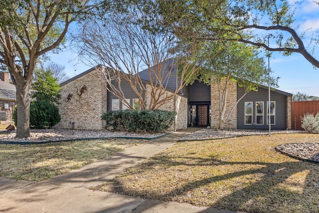 view of front of home with a front yard