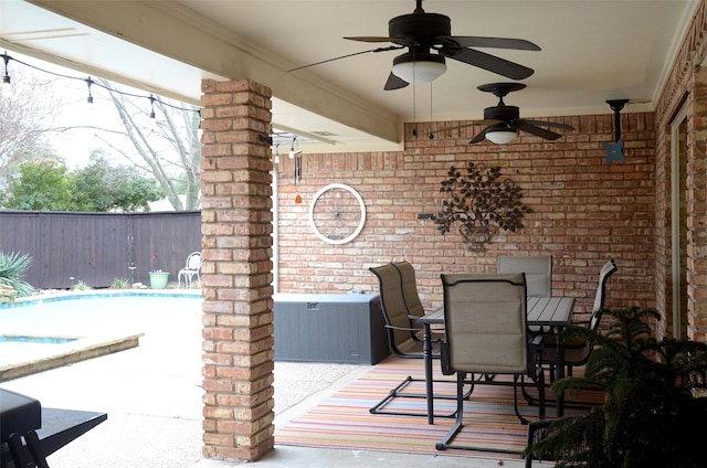 view of patio with a fenced in pool