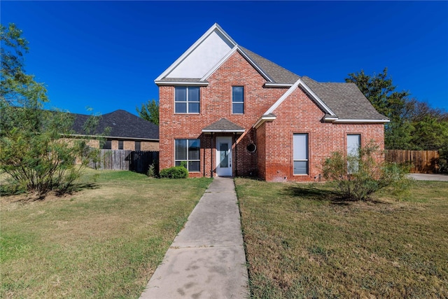 front facade with a front lawn