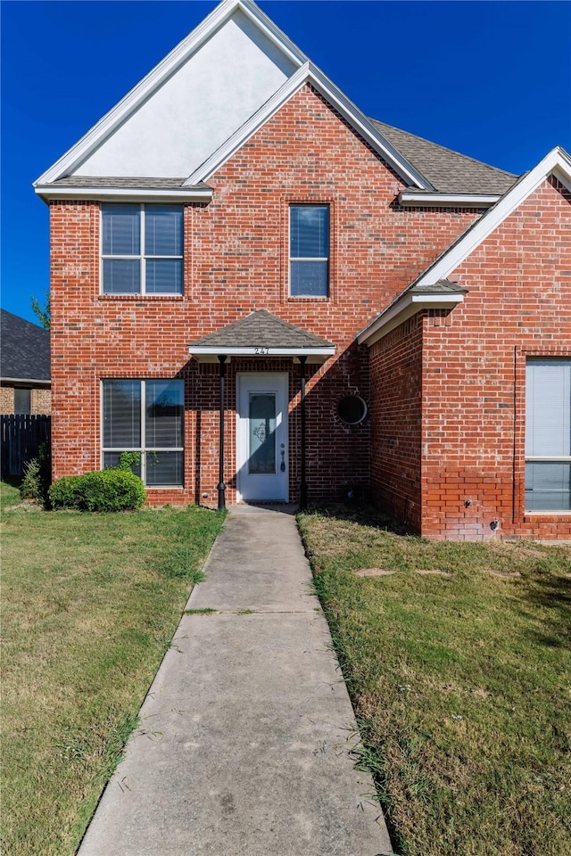 view of property with a front lawn