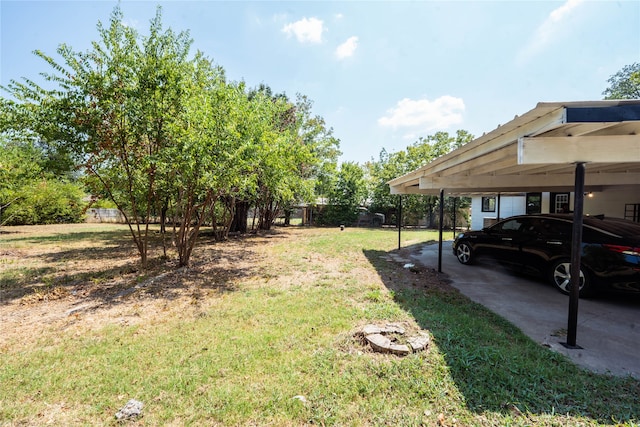 view of yard featuring a carport