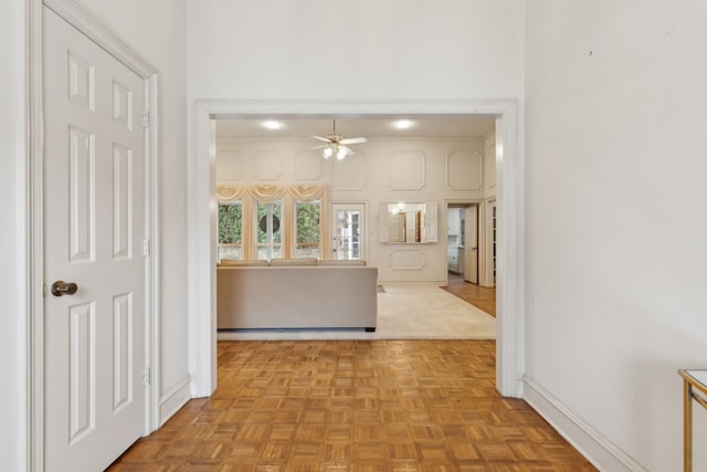 hall with light parquet floors