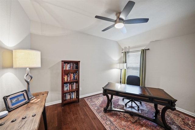 office featuring dark wood-type flooring, vaulted ceiling, and ceiling fan