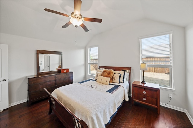 bedroom with lofted ceiling, dark wood-type flooring, and ceiling fan