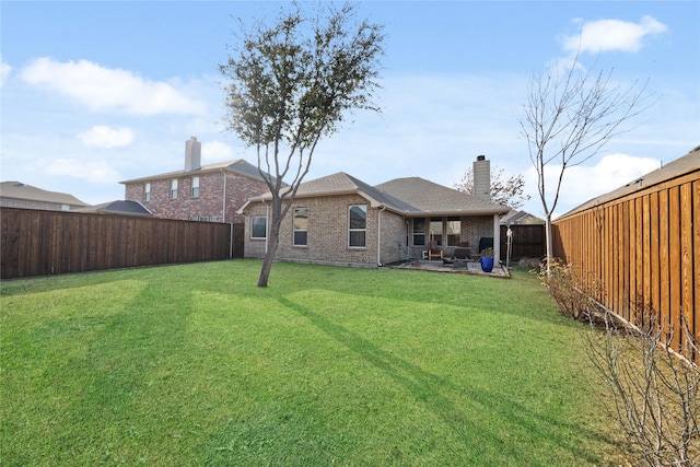 view of yard with a patio area