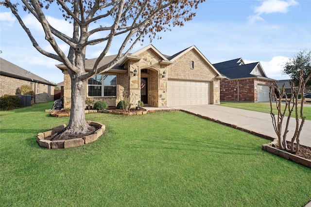 ranch-style home featuring a garage and a front yard