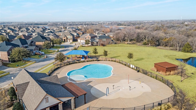 view of pool with a yard and a patio area