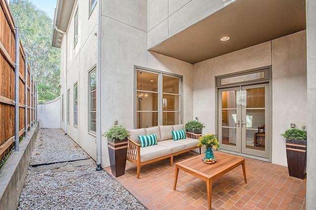 view of patio / terrace featuring french doors and an outdoor living space