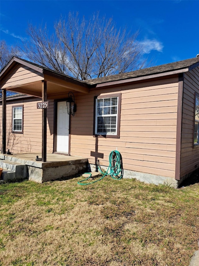 view of front of home with a front yard