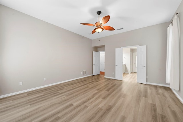 unfurnished bedroom with ceiling fan and light hardwood / wood-style floors