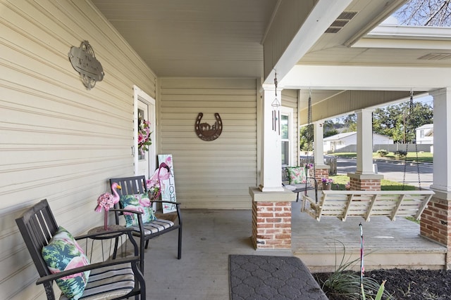 609 S Elm St, Weatherford, TX 76086 - view of patio featuring a porch