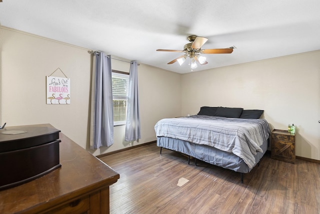 609 S Elm St, Weatherford, TX 76086 - bedroom with ceiling fan, baseboards, and wood finished floors