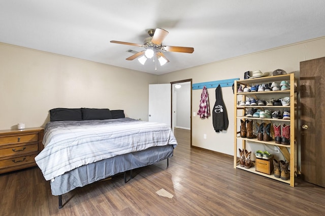 609 S Elm St, Weatherford, TX 76086 - bedroom featuring baseboards, wood finished floors, and ceiling fan