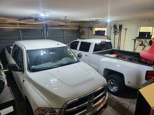 609 S Elm St, Weatherford, TX 76086 - garage featuring a garage door opener