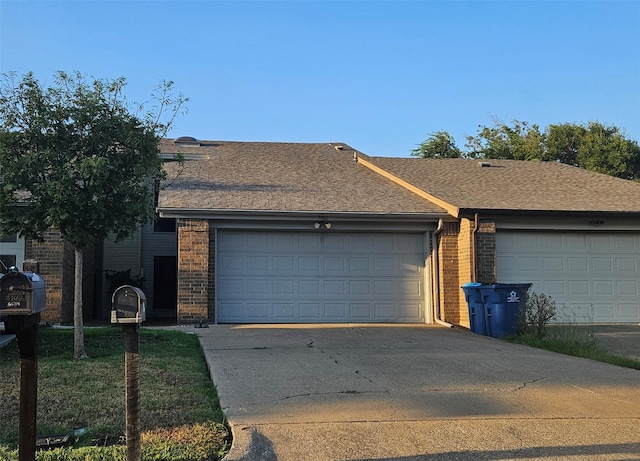 single story home featuring a garage