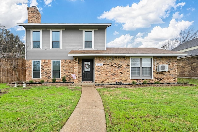 view of property featuring a front lawn