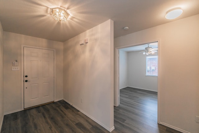 foyer with dark hardwood / wood-style flooring