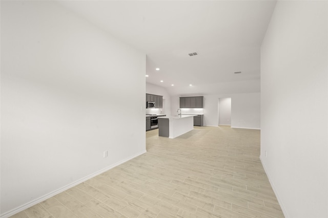 400 Basalt Dr, Azle, TX 76020 - hallway with baseboards, a sink, recessed lighting, and light wood finished floors