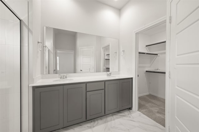 400 Basalt Dr, Azle, TX 76020 - bathroom with a walk in closet, marble finish flooring, double vanity, and tiled shower