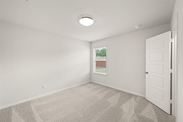 400 Basalt Dr, Azle, TX 76020 - unfurnished room with carpet, baseboards, and a smoke detector