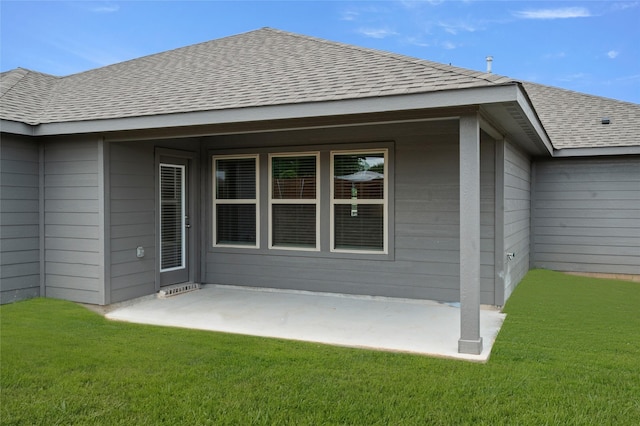 400 Basalt Dr, Azle, TX 76020 - back of house featuring roof with shingles, a patio area, and a lawn