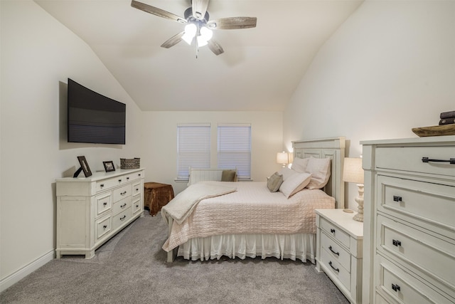 carpeted bedroom with ceiling fan and lofted ceiling