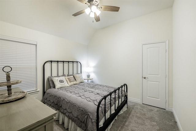 bedroom with lofted ceiling, carpet flooring, and ceiling fan
