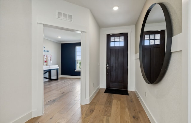 foyer entrance featuring light hardwood / wood-style floors