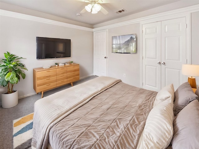 carpeted bedroom with ceiling fan