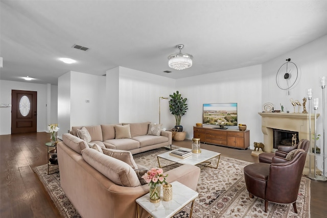 living room with dark hardwood / wood-style floors