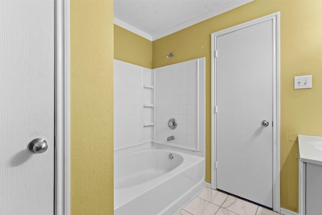 bathroom featuring shower / washtub combination, a textured ceiling, and vanity