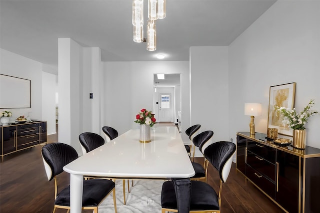 dining room with dark hardwood / wood-style floors