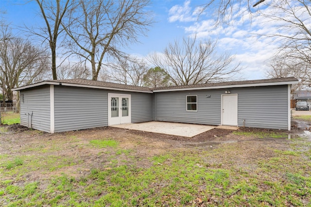 back of house with a patio area and french doors